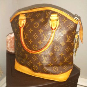 LOUIS VUITTON Vintage Monogram LockIt Handbag